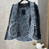 Side profile of Louis Vuitton luxury clothing with label-forward styling