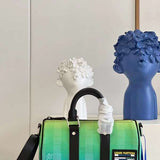Side profile of everyday-luxe refined women's handbag – women's luxury handbag