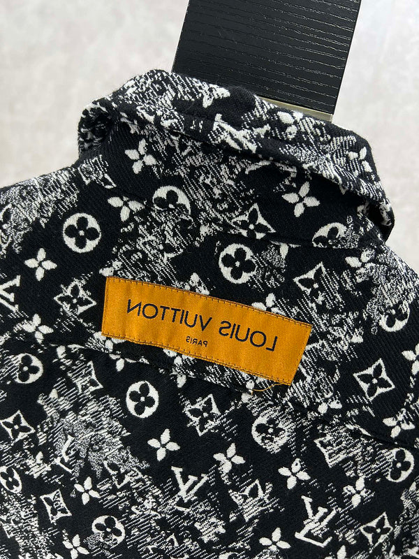 Close-up detail shot of Louis Vuitton luxury clothing with label-forward styling