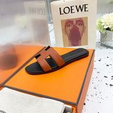 Hermès Tan Crisscross Strap Sandals - Close-Up Texture View