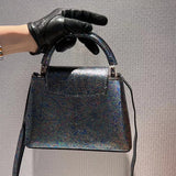  curated top-handle bag detail view showing craftsmanship