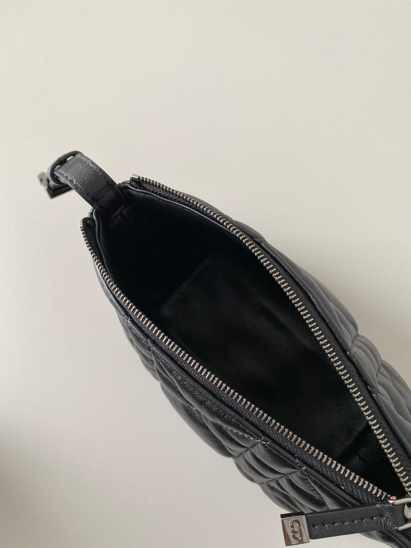 Back view of elevated refined women's handbag – women's luxury handbag