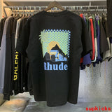 Side profile of Rhude luxury clothing with tailored silhouette