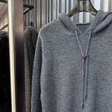 Close-up detail shot of Louis Vuitton luxury clothing with everyday silhouette