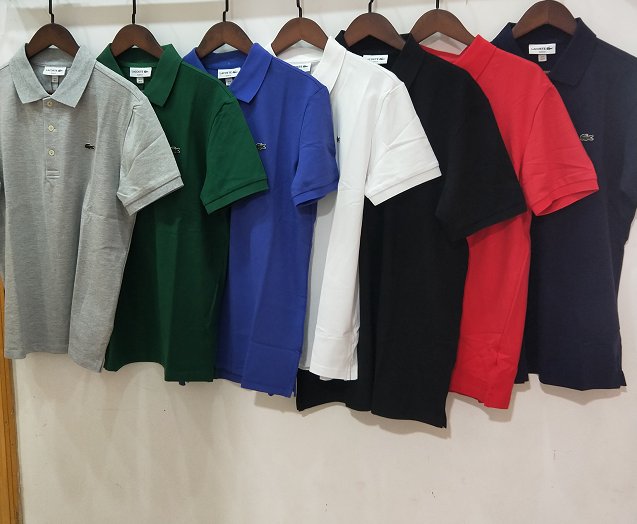 Side profile of Lacoste luxury clothing with signature branding