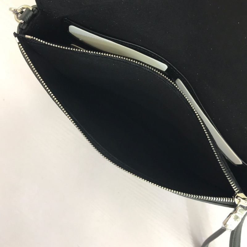 Side profile of structured sleek women's handbag – women's everyday handbag