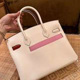  Signature tote bag carried on shoulder 10