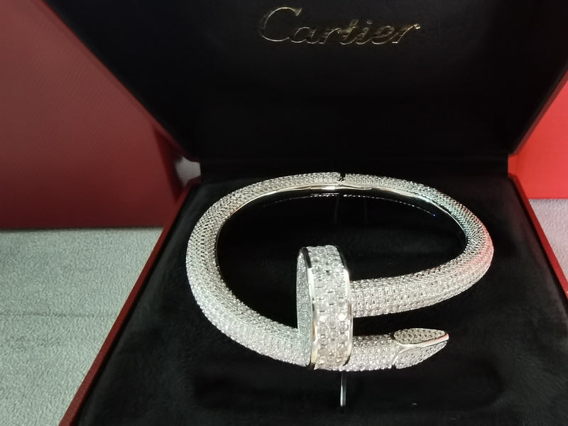 Close-up detail view of Cartier unisex jewelry piece