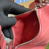 Side profile of elevated refined women's handbag – women's designer-style accessory