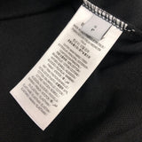 Side profile of Polo cotton polo shirt with monogram-inspired silhouette