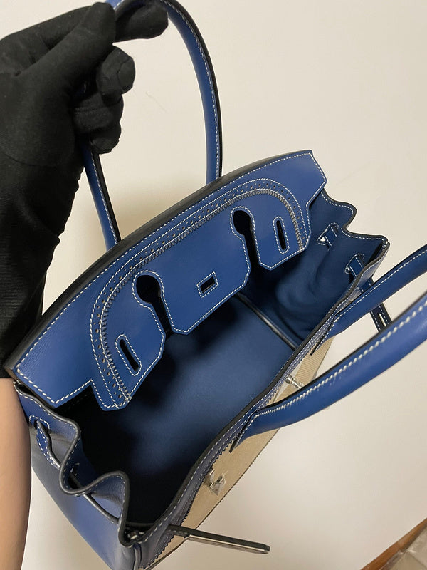 Side view of refined structured handbag