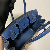 Side view of refined structured handbag