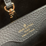  Sleek structured bag carried on shoulder 34