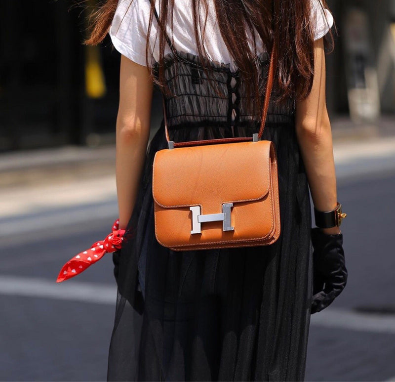 Side view of refined structured handbag