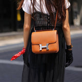 Side view of refined structured handbag