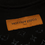 Side profile of Louis Vuitton luxury clothing with signature branding