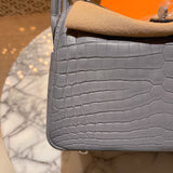 Side view of elegant structured handbag