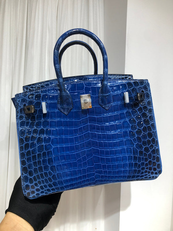 Close-up detail of sculpted bag design