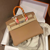 Side view of classic structured handbag