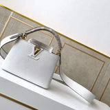 Side profile of polished chic women's handbag – women's luxury accessory