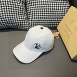 Side view of Burberry unisex cap