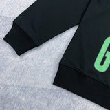 Full styled look of Gucci luxury clothing with signature branding