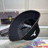Close-up detail view of Louis Vuitton unisex cap