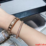 Close-up detail view of Van Cleef & Arpels unisex jewelry piece