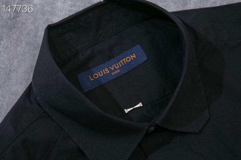 Close-up detail shot of Louis Vuitton luxury clothing with monogram-inspired silhouette