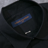 Close-up detail shot of Louis Vuitton luxury clothing with monogram-inspired silhouette