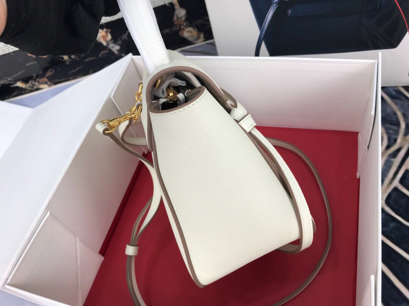 Handle and strap detail of statement structured women's handbag – women's luxury accessory