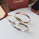 Close-up detail view of Cartier unisex jewelry piece
