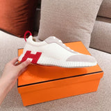 Hermès Red Classic Ballet Flats - Angled View