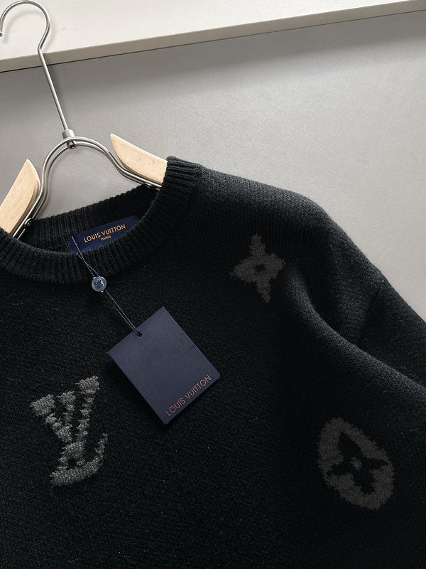 Close-up detail shot of Louis Vuitton luxury clothing with signature branding