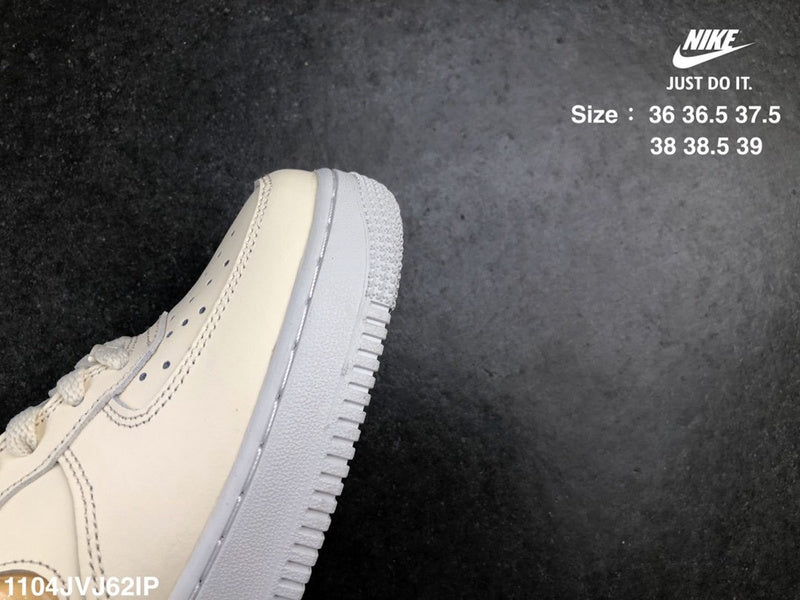 Nike Men's & Women's Premium Low-Top Trainers — Style 013 front view