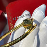 Front view of Cartier unisex jewelry piece