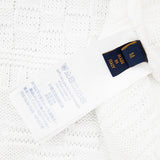 Close-up detail shot of Louis Vuitton luxury clothing with everyday silhouette