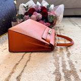 Side view of sophisticated structured handbag