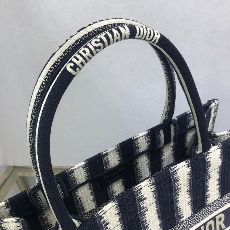 Styled lifestyle shot of modern statement women's handbag – women's luxury accessory