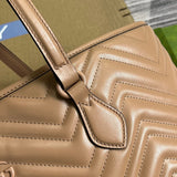 Styled lifestyle shot of signature refined women's handbag – women's luxury accessory
