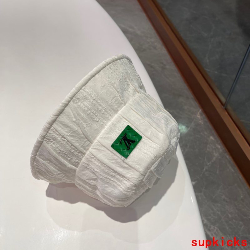 Close-up detail view of Louis Vuitton unisex cap