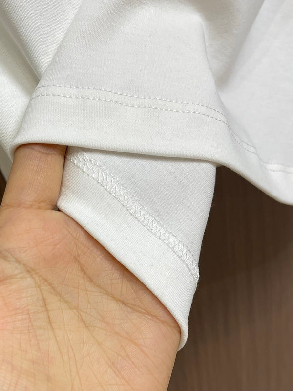 Close-up detail shot of Louis Vuitton luxury clothing with tailored silhouette