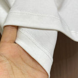 Close-up detail shot of Louis Vuitton luxury clothing with tailored silhouette
