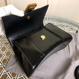 Top view of chic sleek women's handbag – women's luxury accessory