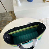 Handle and strap detail of chic sleek women's handbag – women's designer-style accessory