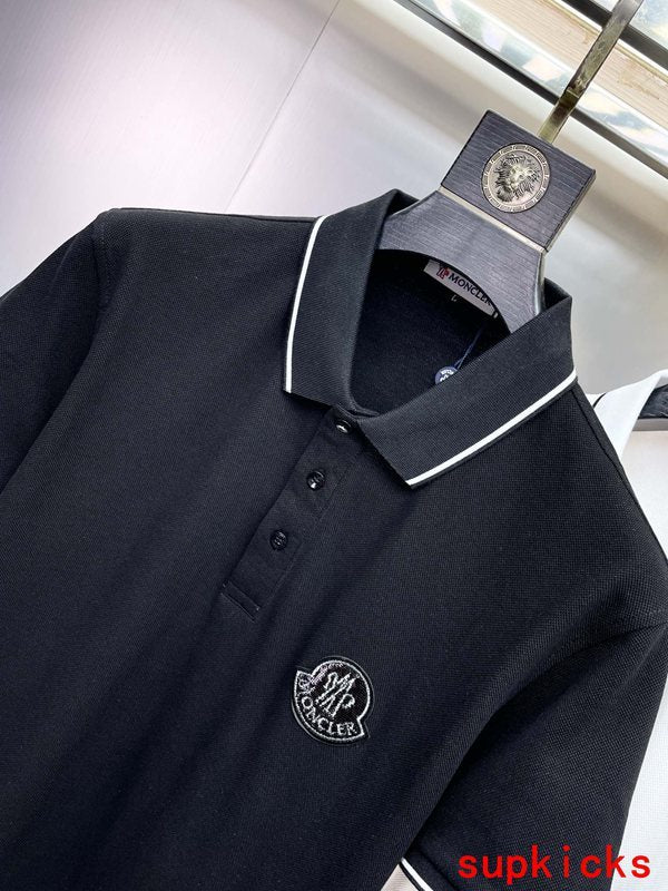 Full styled look of Moncler luxury clothing with logo-detail design
