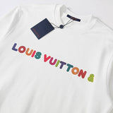 Flat lay presentation of Louis Vuitton luxury clothing with signature branding