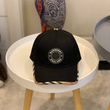 Close-up detail view of Burberry unisex cap