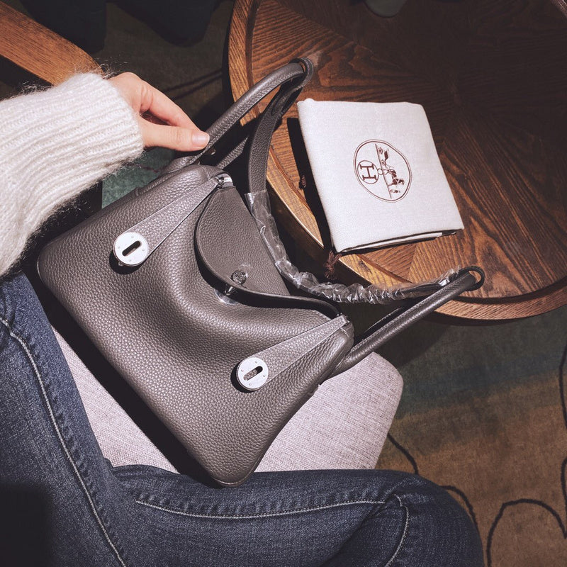 Side view of refined structured handbag