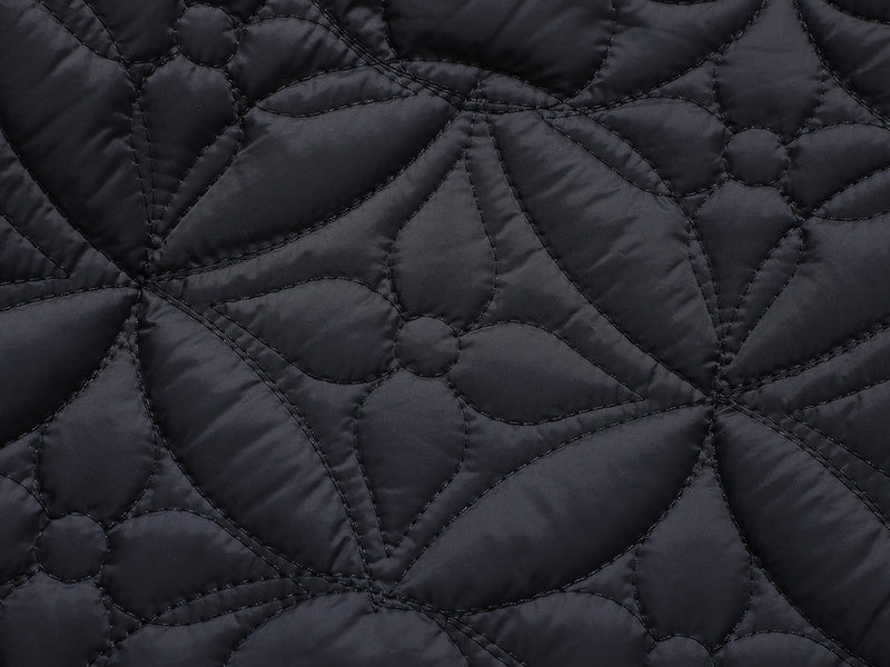 Back view of Louis Vuitton luxury clothing with monogram-inspired silhouette
